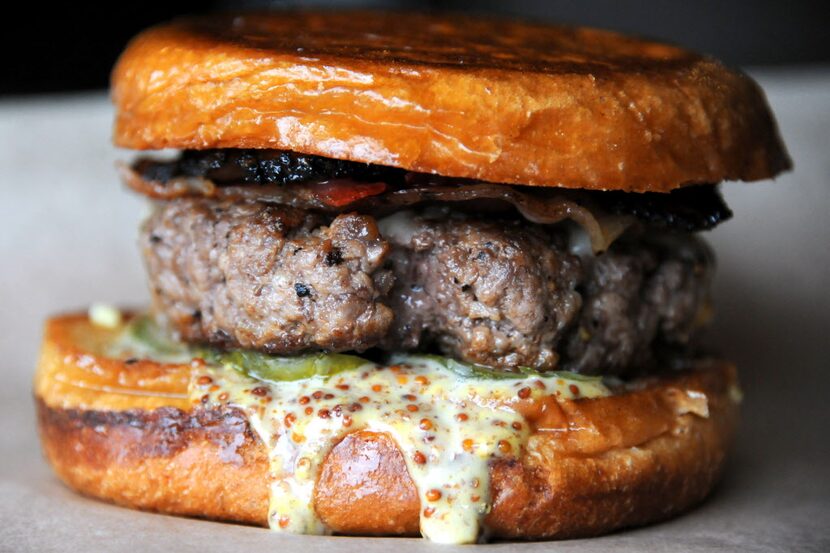 Rodeo Goat signature dishes  Chaca Oaxaca Burger, Sugar Burger, Nanny Goat Burger, Cheese Fries Surprise, various local and Texas craft beers.